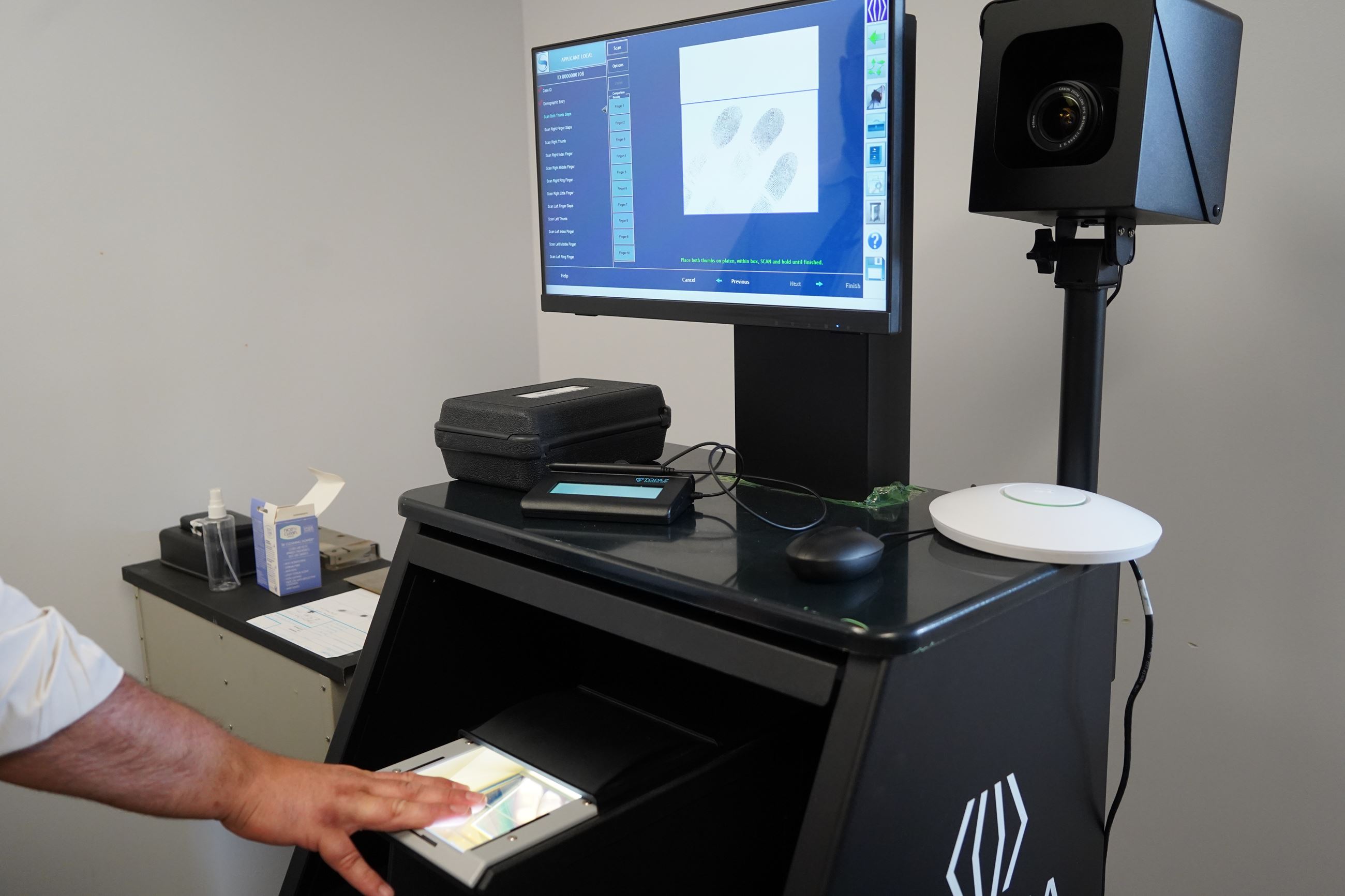 Clayton Police Department's Fingerprinting Service, Which Includes a Scanner