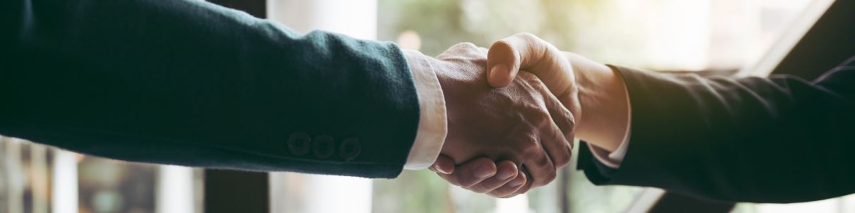 Two people shaking hands